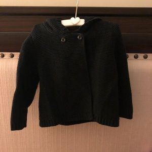 Black hooded sweater